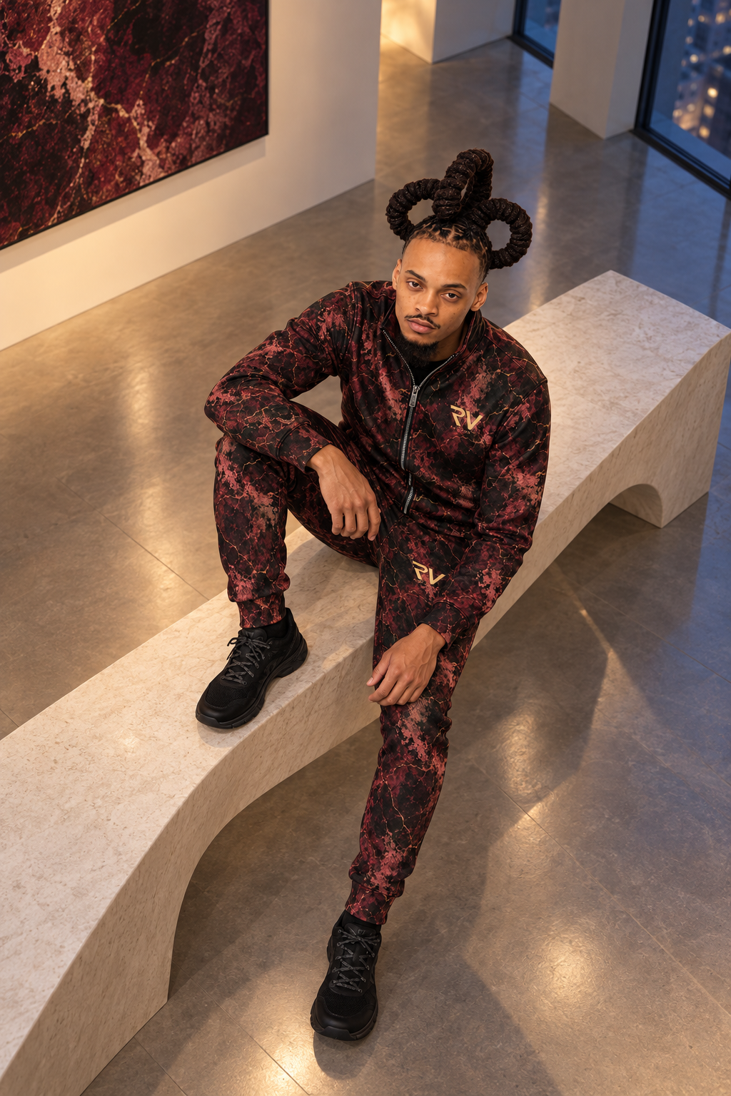 AI Rue character styling concept: high-angle gallery portrait seated on a stone bench in Garnet Nocturne. Refer to catalog images for exact product details.